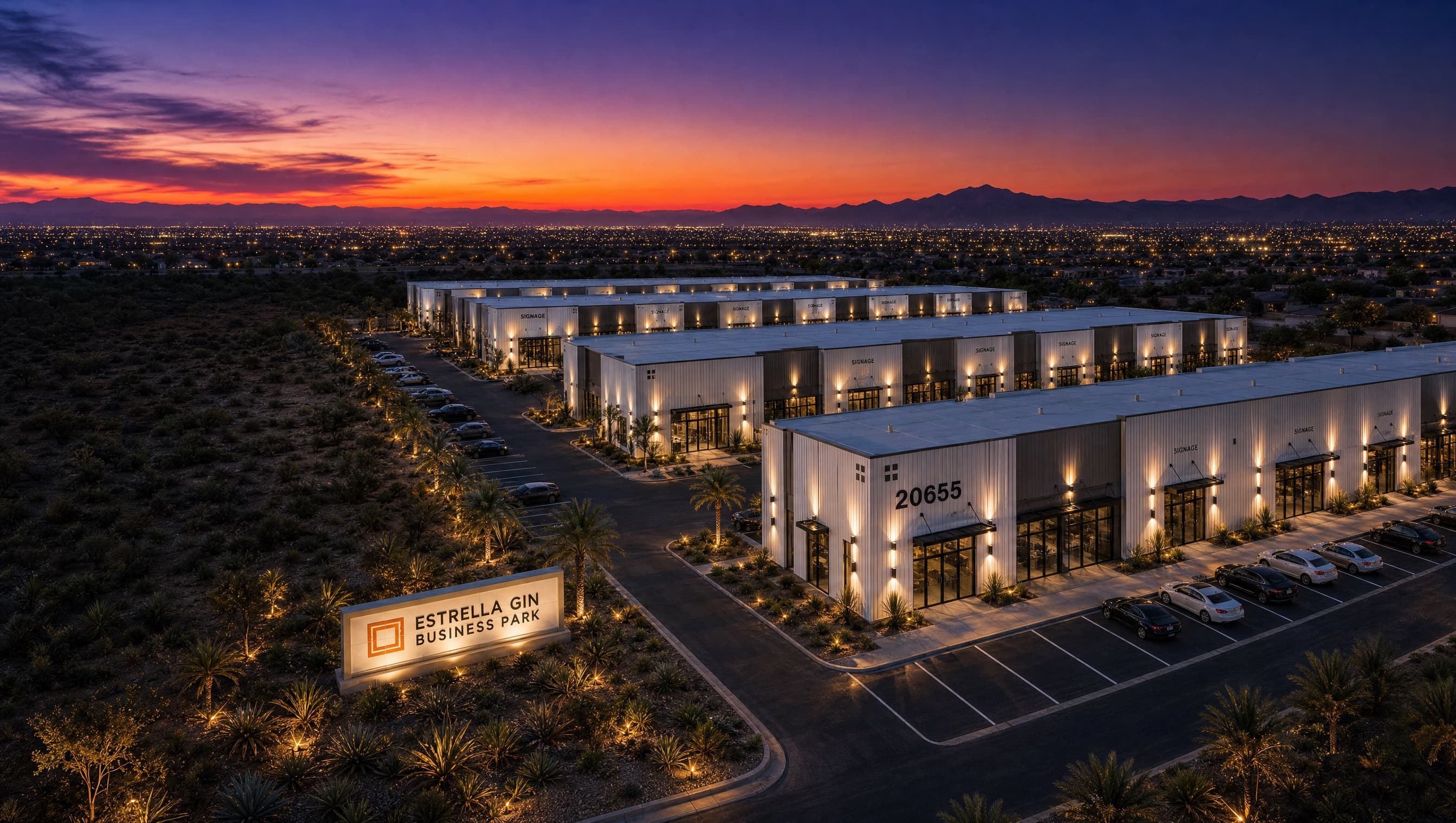 Dusk aerial rendering of Estrella Gin Business Park with the monument sign and modern flex-industrial buildings